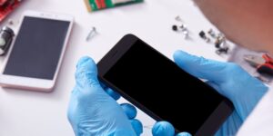 Mobile phone hand in technician