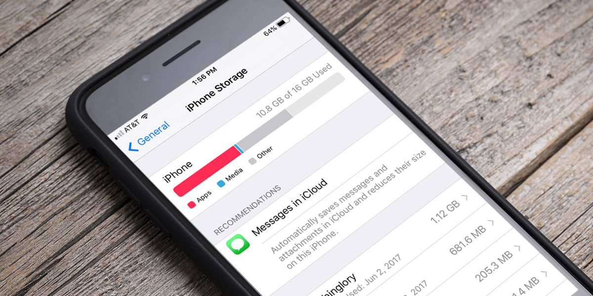 iPhone storage screen displaying used space breakdown and recommendation to store messages in iCloud