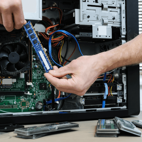 Man holding Ram Slot for repair
